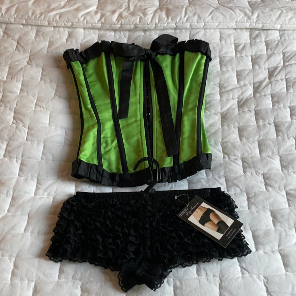 Rave Green corset with black ruffle booty shorts
